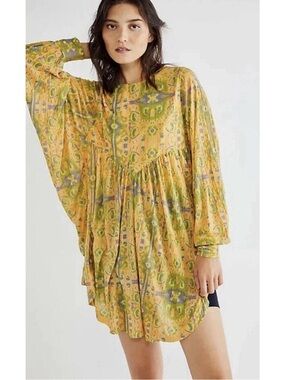 Free People "This Is It" oversized long-sleeve tunic top.